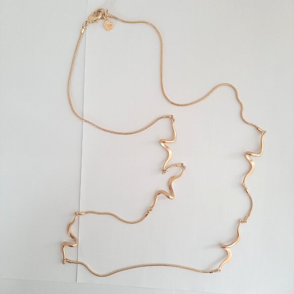 Trina Turk Glossy Gold Wavy Long Necklace - Picture 3 of 5